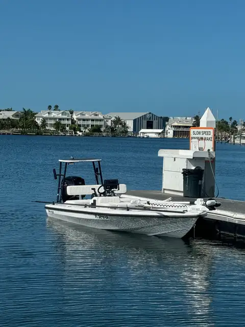 Purple Heron Charters 18’ Dolphin Backcountry Pro skiff at Historic Charter Boat Row, Key West
